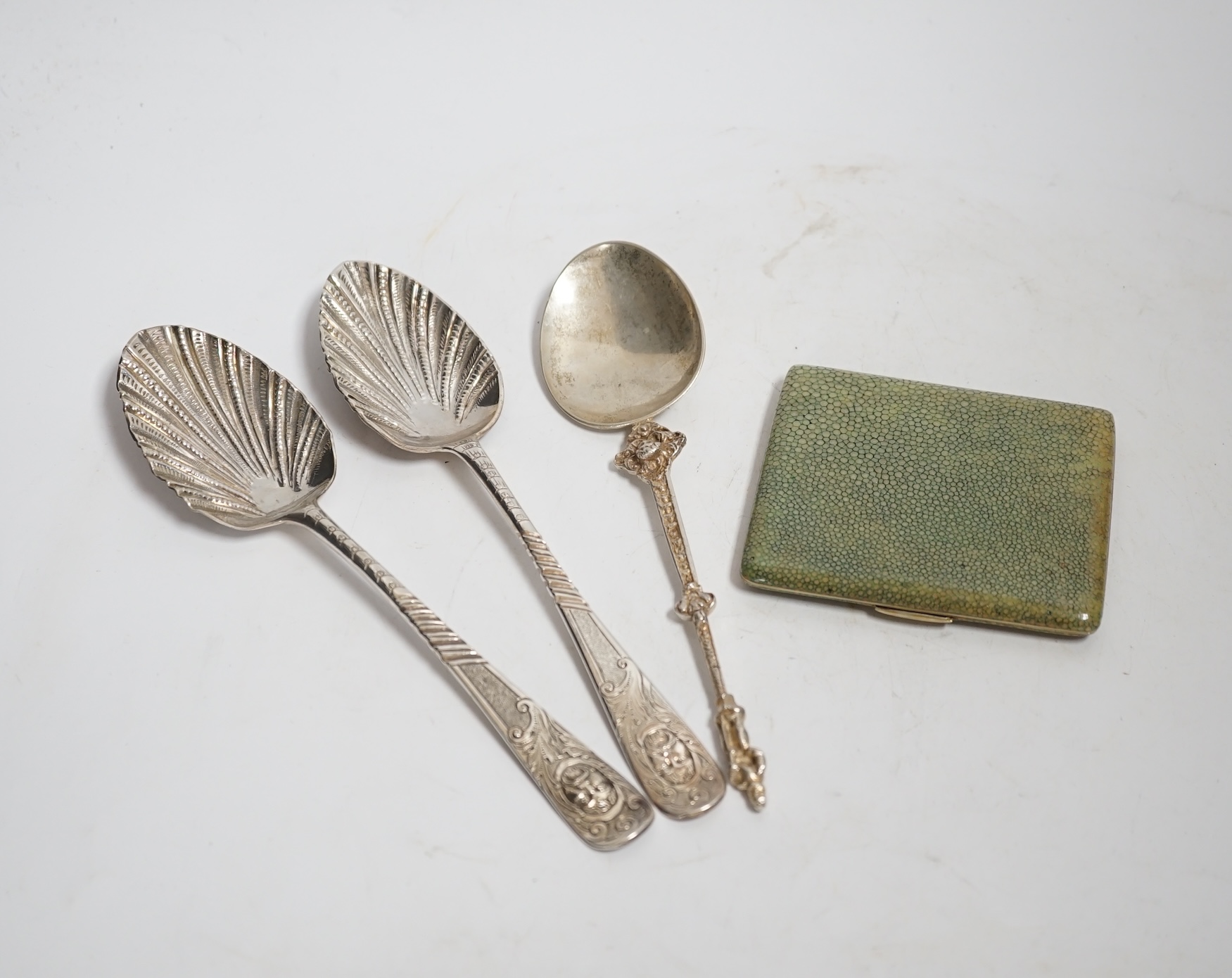 A George III Scottish provincial table spoon, with later decoration, Robert Keay I, Perth, circa 1790, 22.5cm, together with a George III silver table spoon with similar decoration, a continental white metal spoon and a